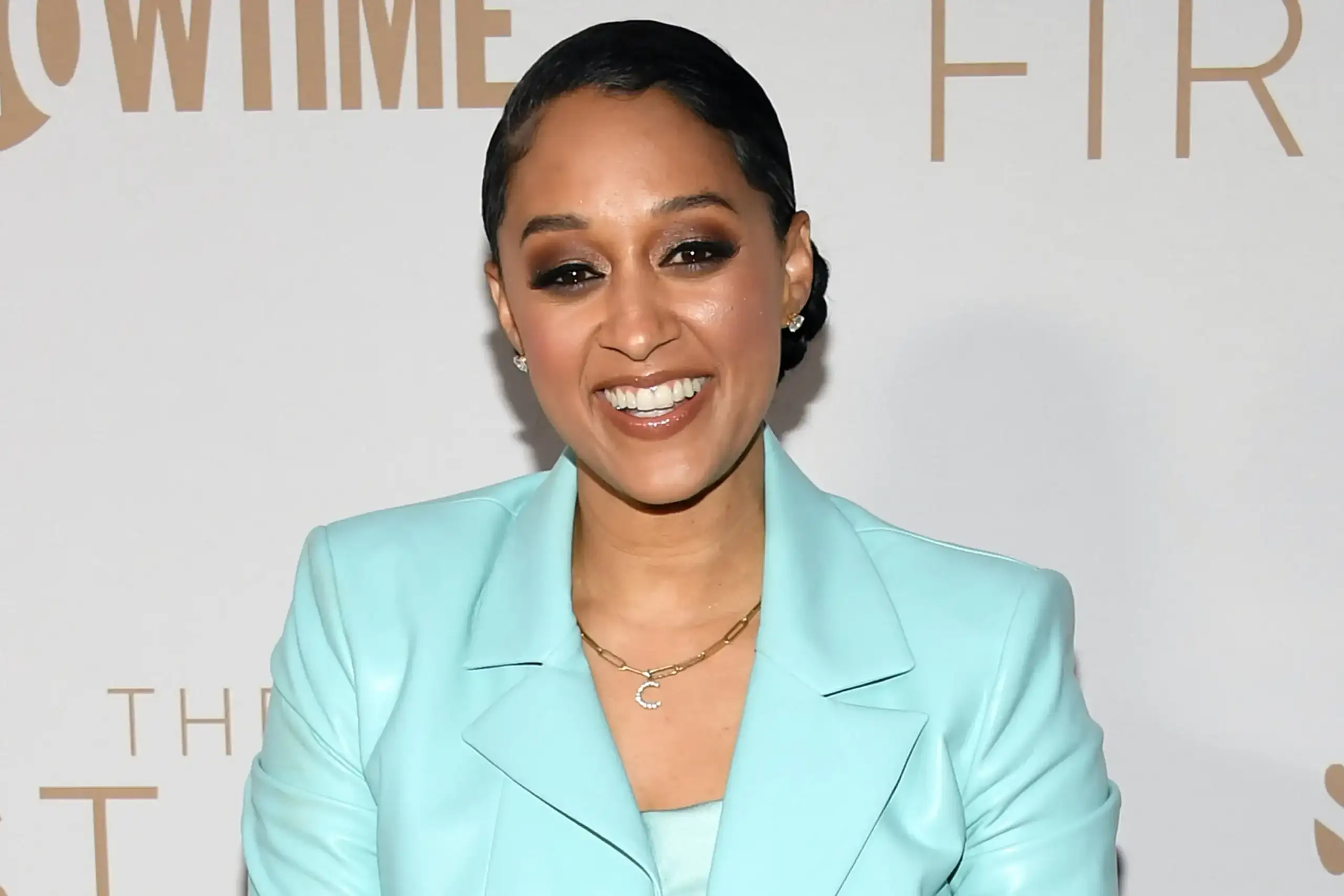 tia mowry curly cornrows scaled