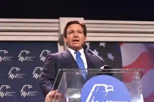 Florida Gov. Ron DeSantis hand-delivered the first six checks in October