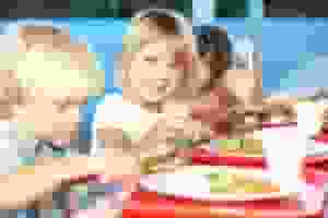 Children Enjoying Meal