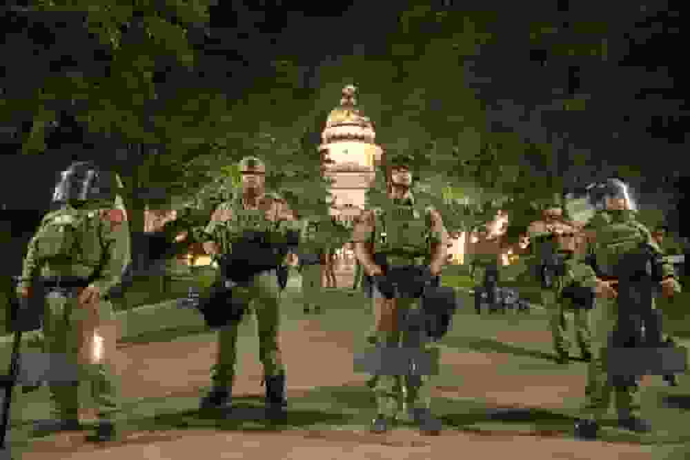 DPS troopers stand outside the Capitol during the summer of 2020 (Photo by John Anderson)